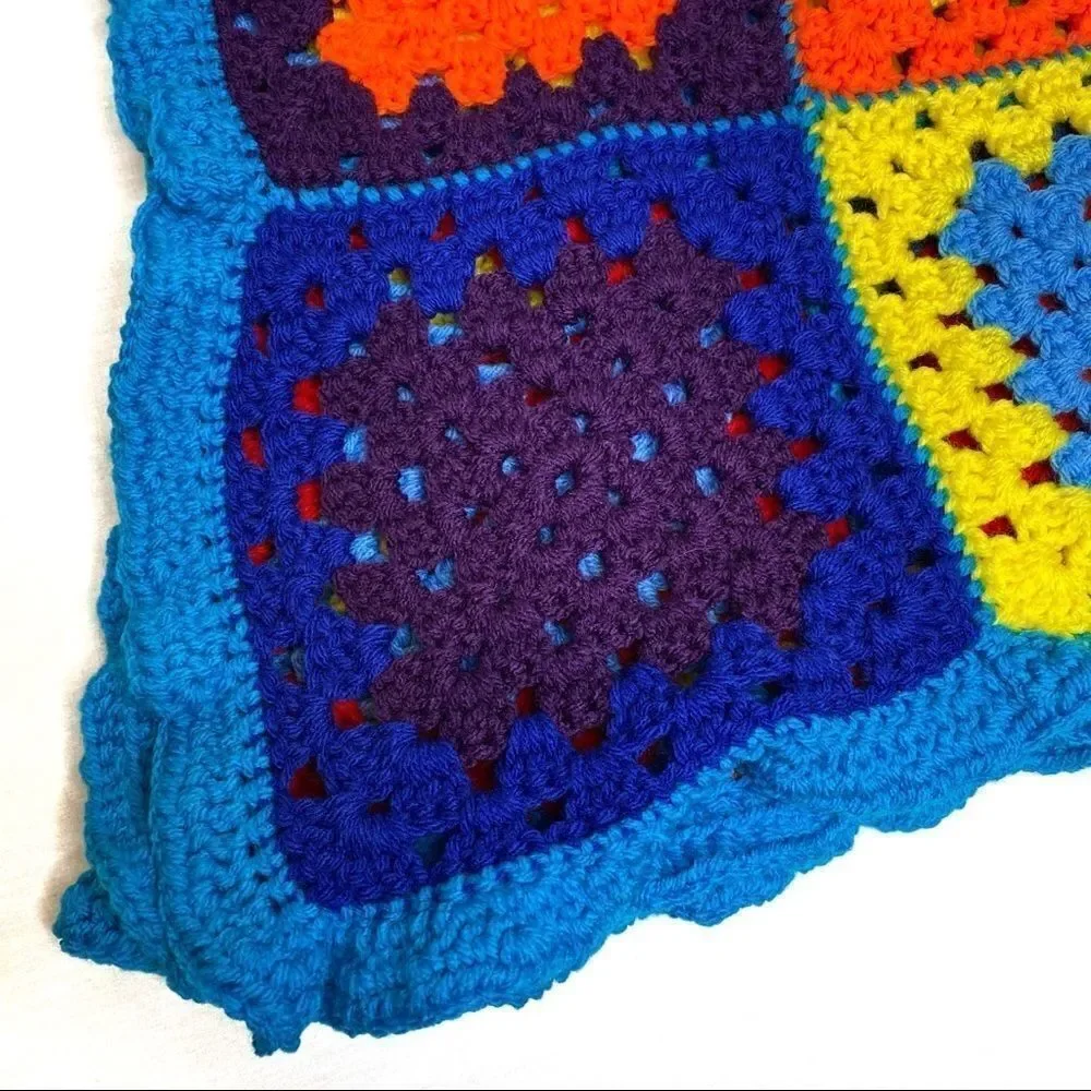 Hand crocheted bright multi colored Afghan size 56” X 31”